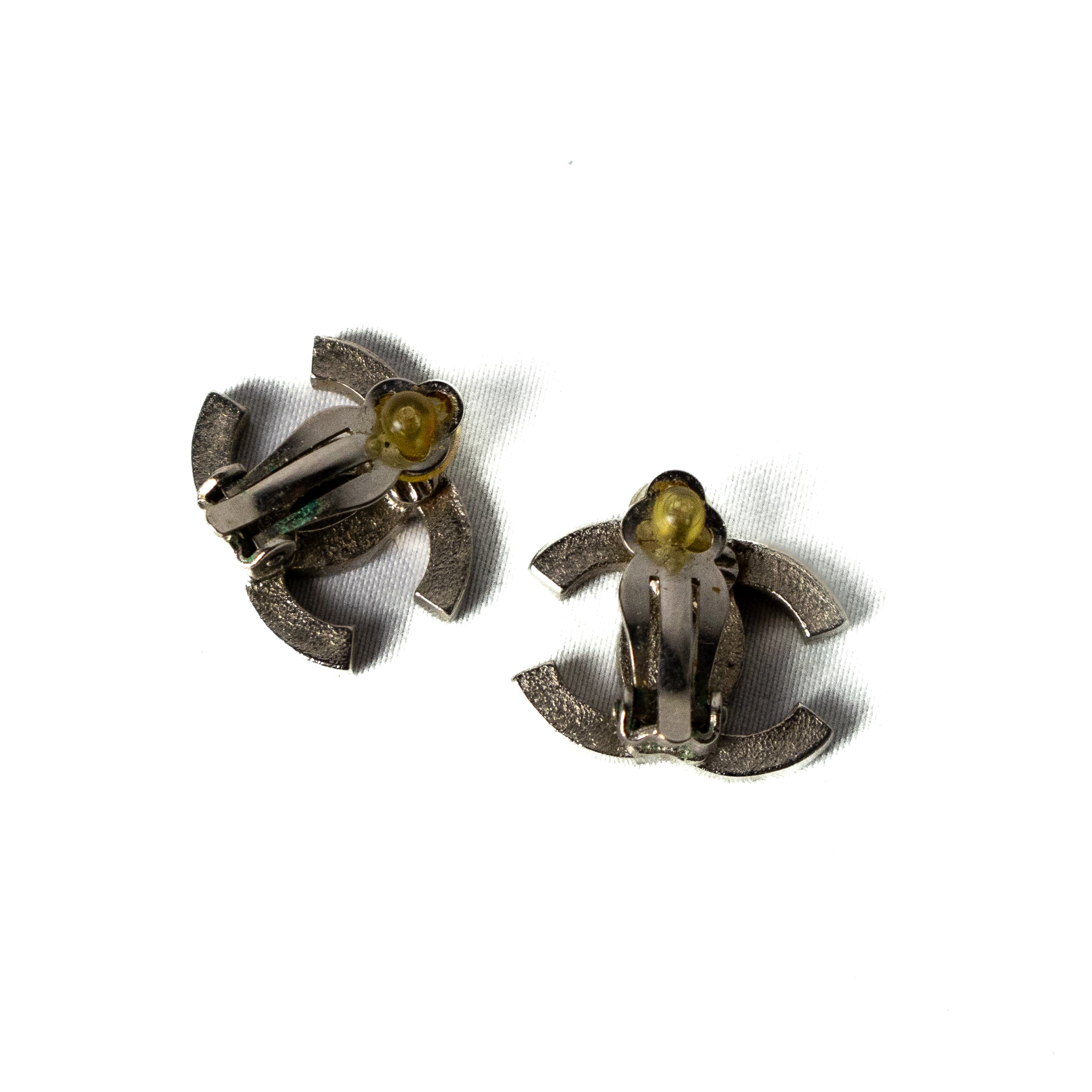 Chanel silver clip on earrings cc