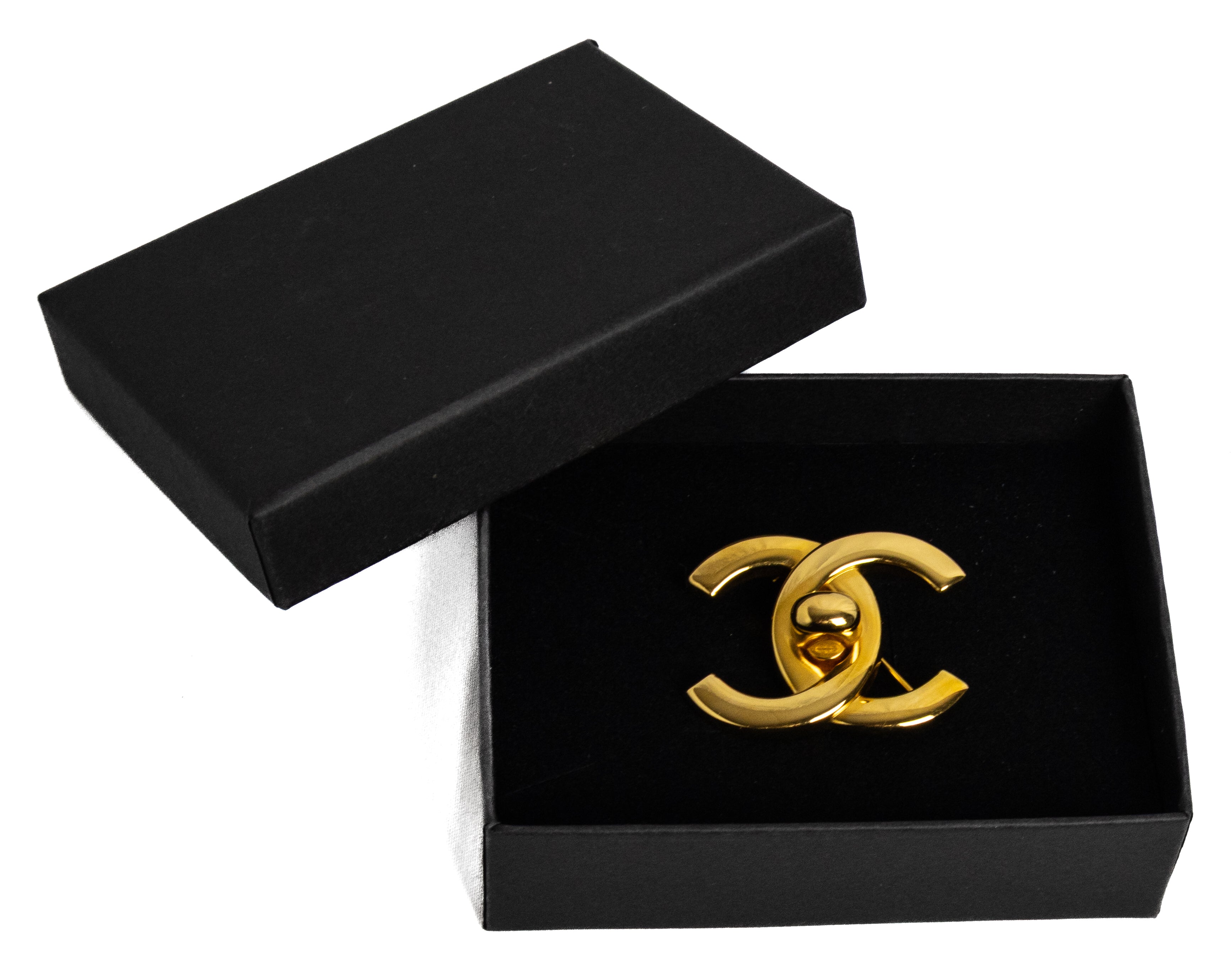 Chanel Turn Lock brooch gold