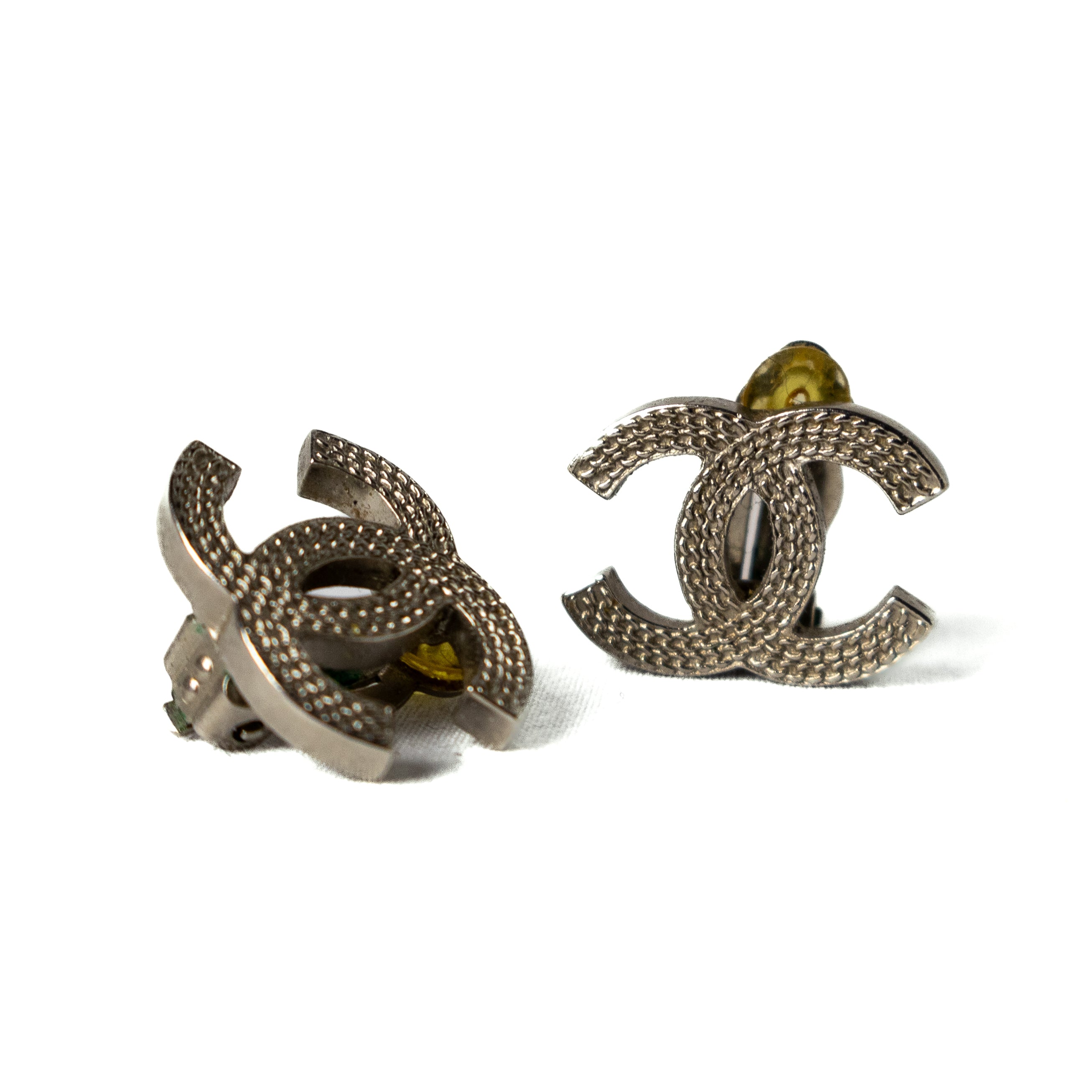 Chanel silver clip on earrings cc