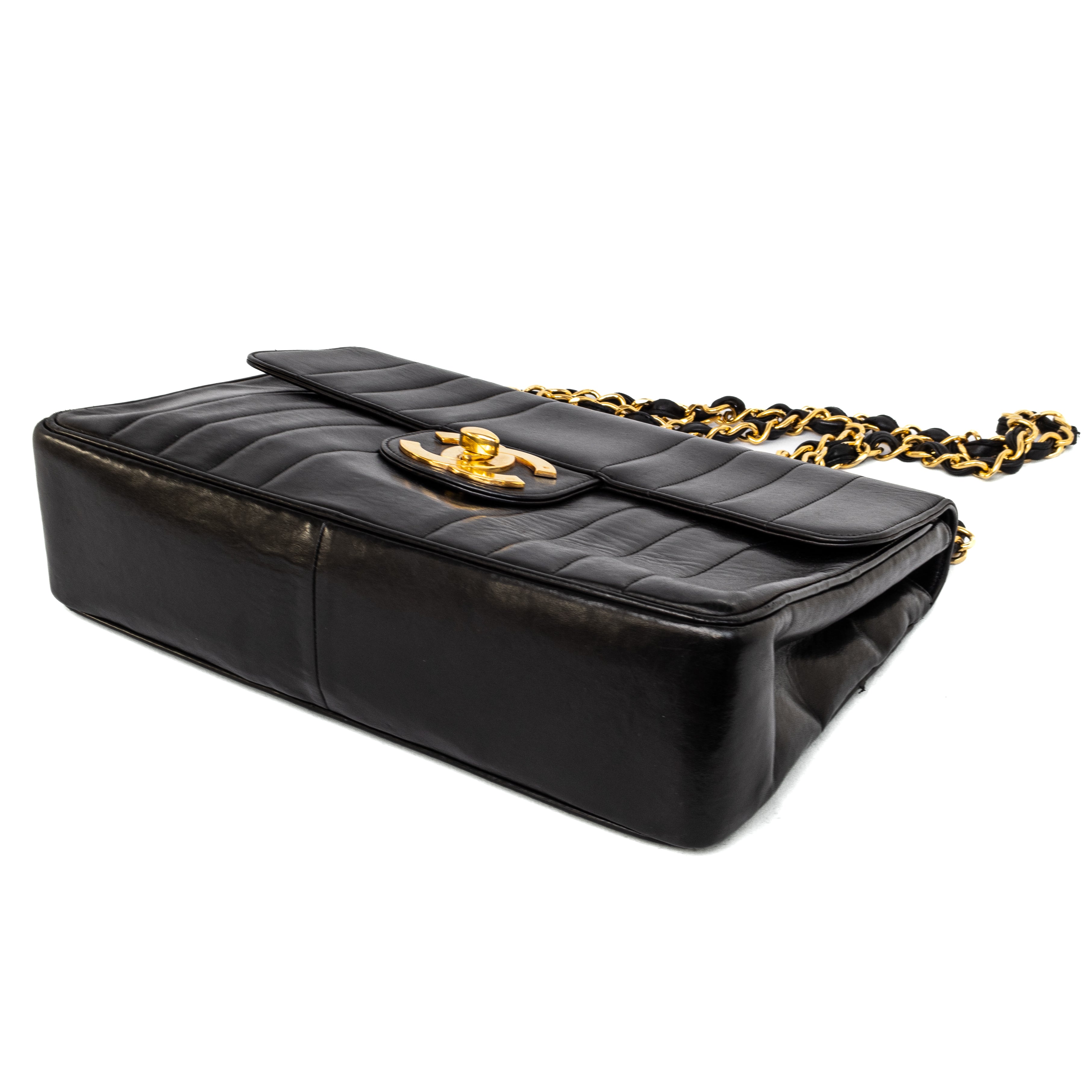 Chanel vintage Jumbo Bag black lambskin 24K gold hardware vertical stripes