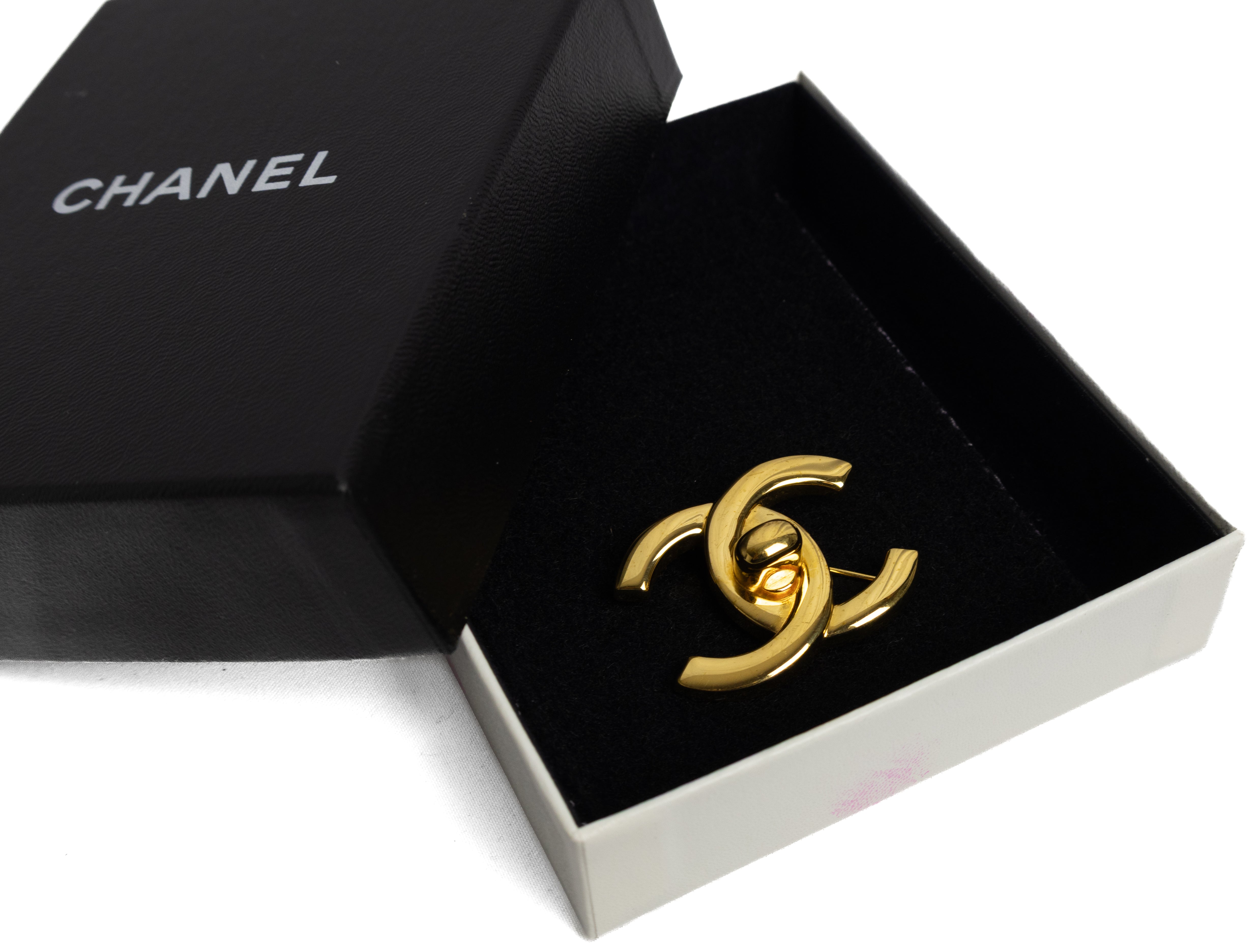 Vintage chanel turn lock brooch gold