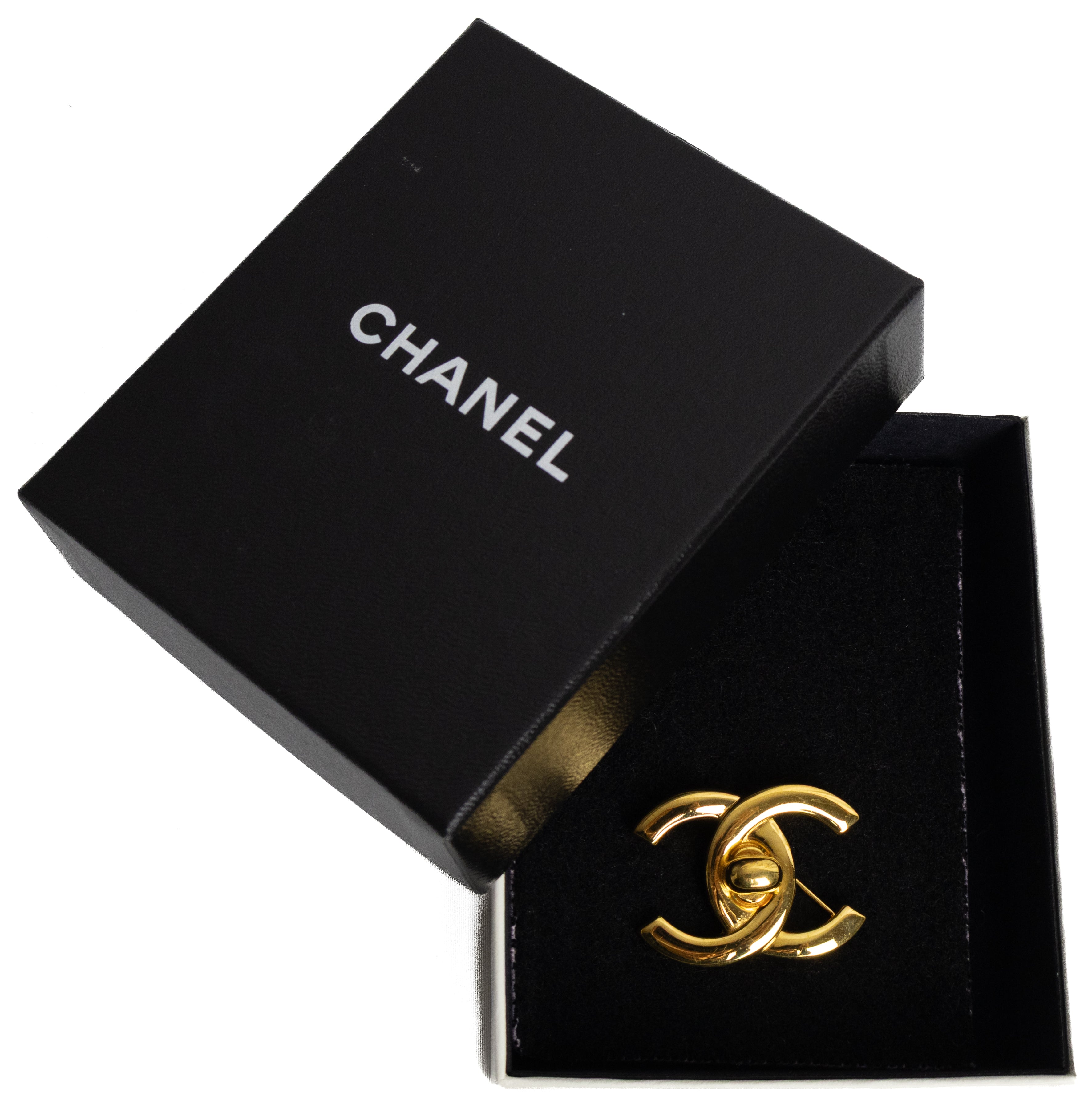 Vintage chanel turn lock brooch gold